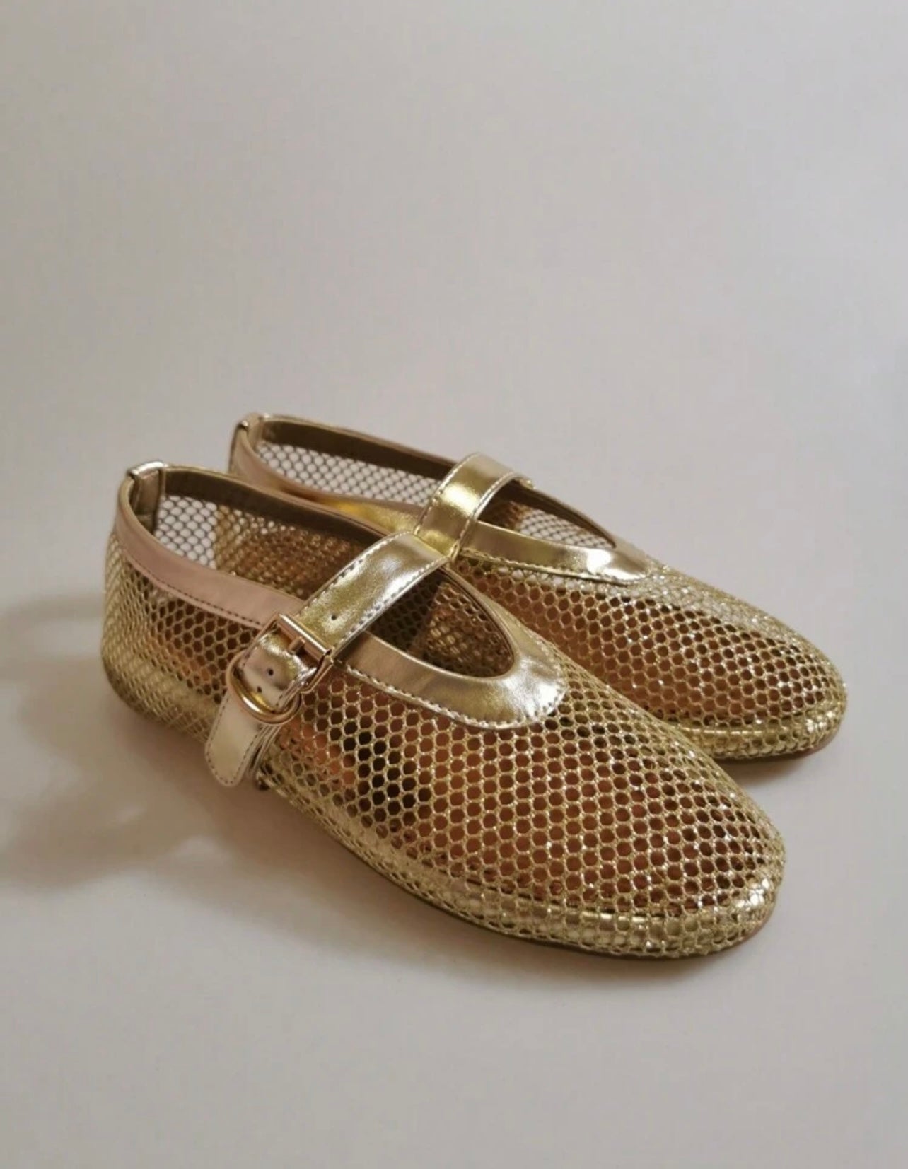 Gold flat ballerinas
