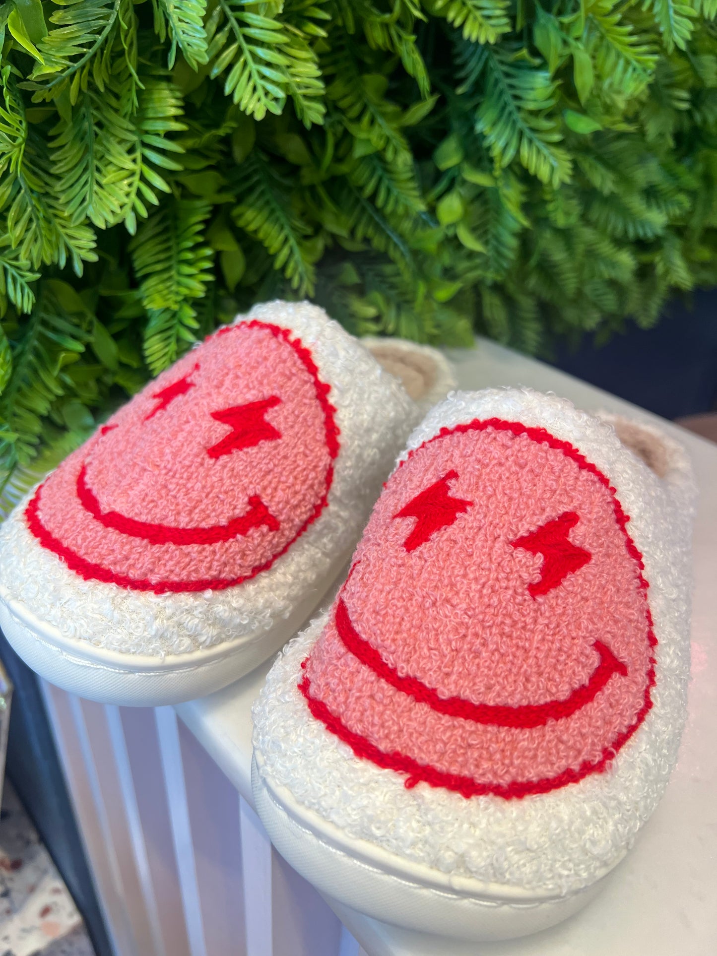 Pink smiley slippers