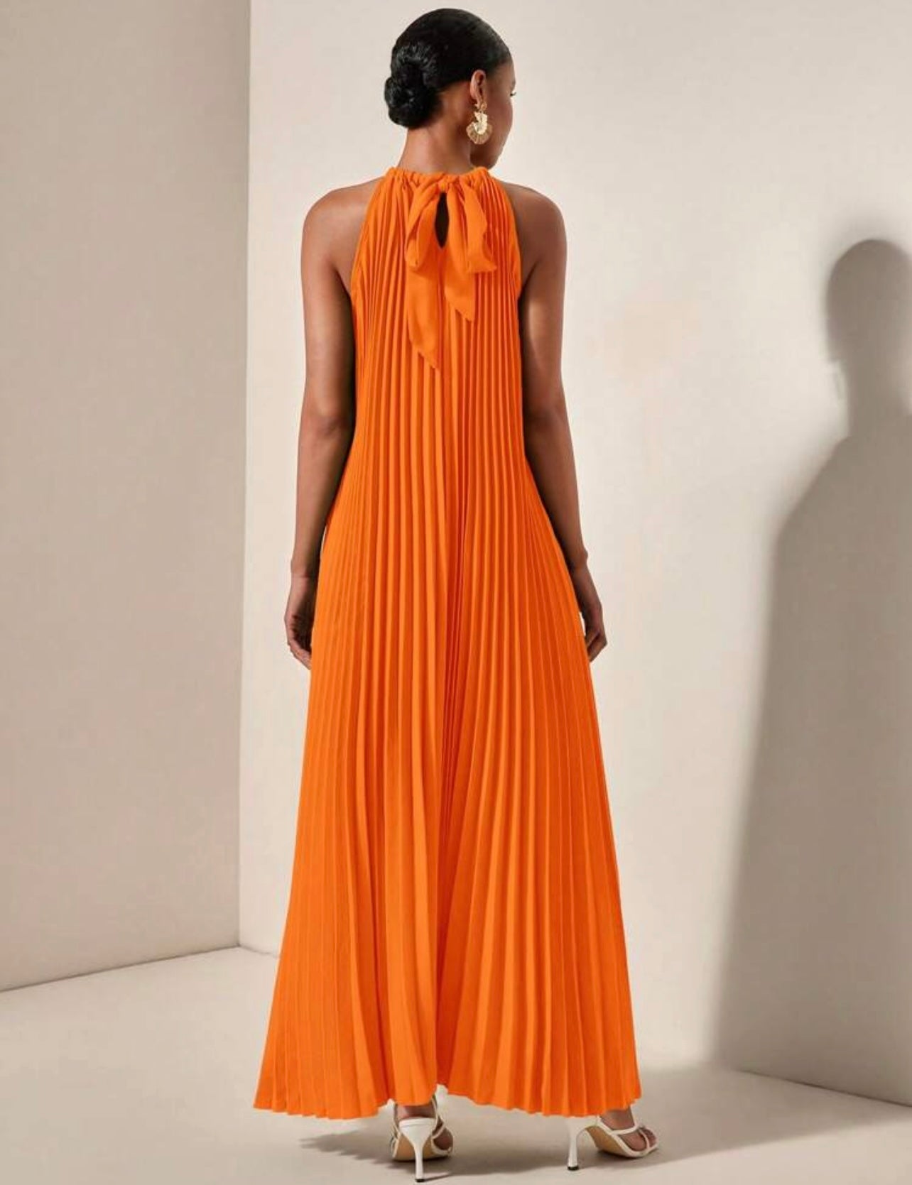 Orange pleated dress