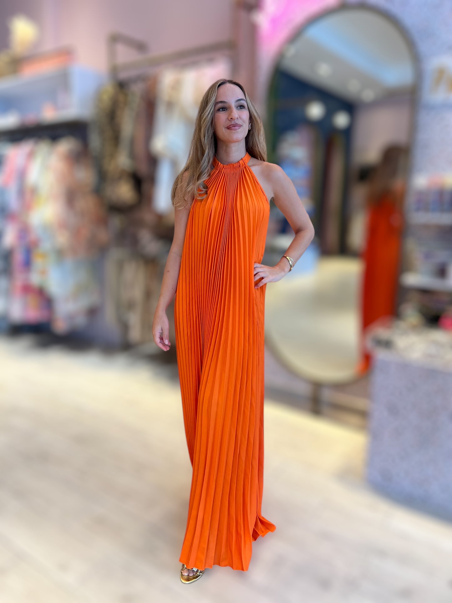 Orange pleated dress