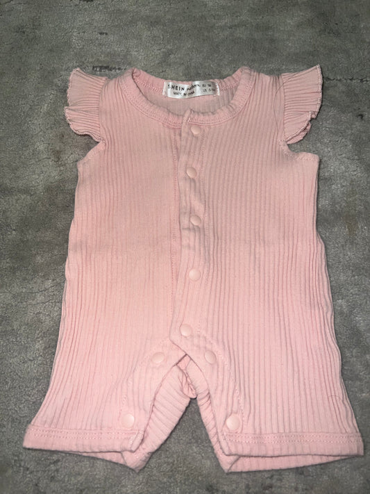 Pink ribbed ruffled body