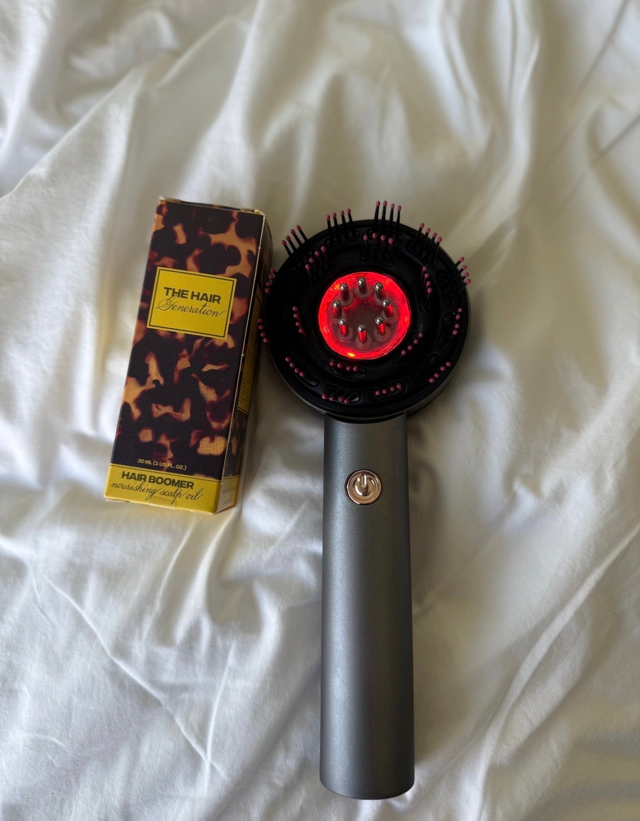 The bundle = red light scalp massager + the Hair generation oil