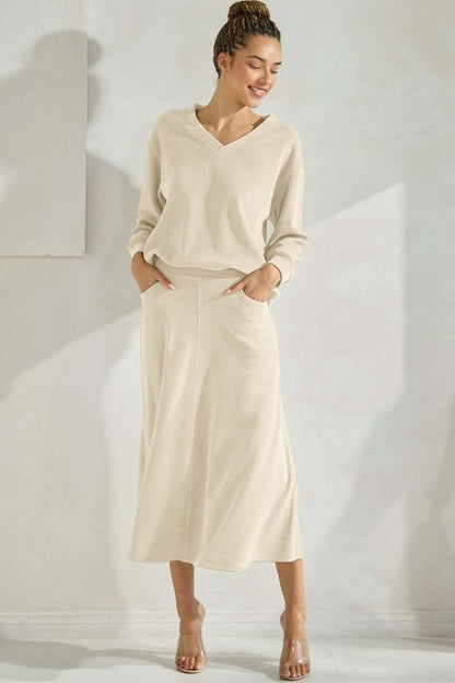 Ivory Tzniut skirt set de viaje 28 feb