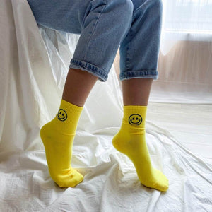neon smiley face socks