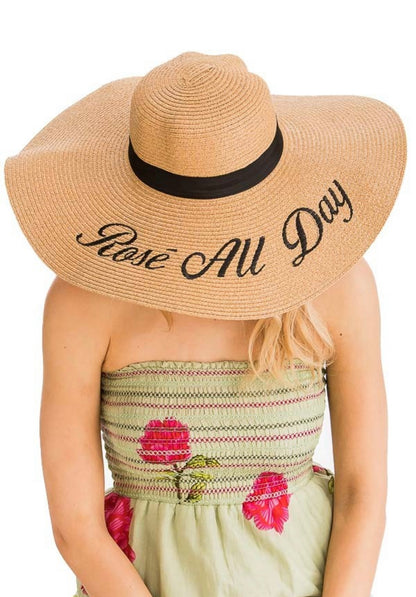 Tan straw hat rose all day