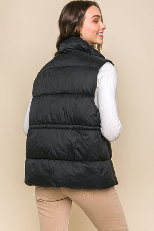Black puffy vest