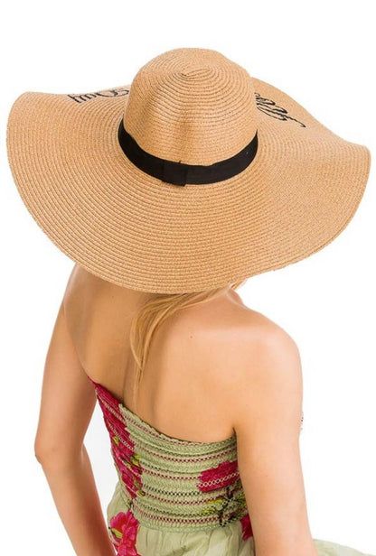 Tan straw hat rose all day