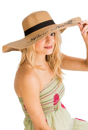 Tan straw hat rose all day